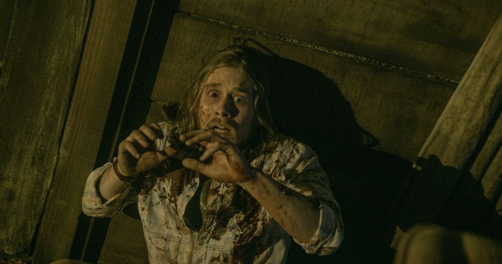 Lou Taylor Pucci in TriStar's horror EVIL DEAD.