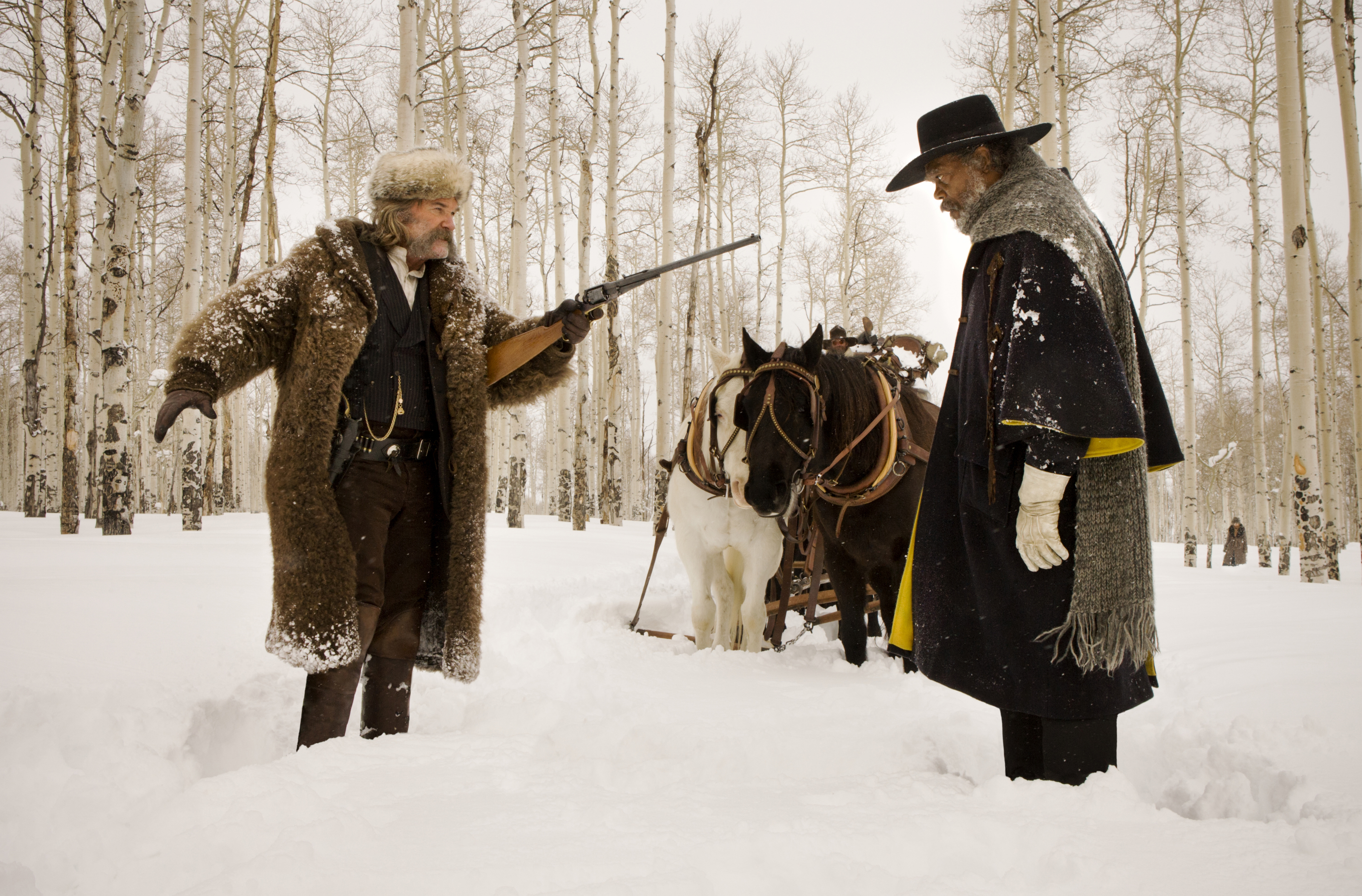 (L-R) KURT RUSSELL and SAMUEL L. JACKSON star in THE HATEFUL EIGHT.  Photo: Andrew Cooper, SMPSP &copy; 2015 The Weinstein Company. All Rights Reserved.