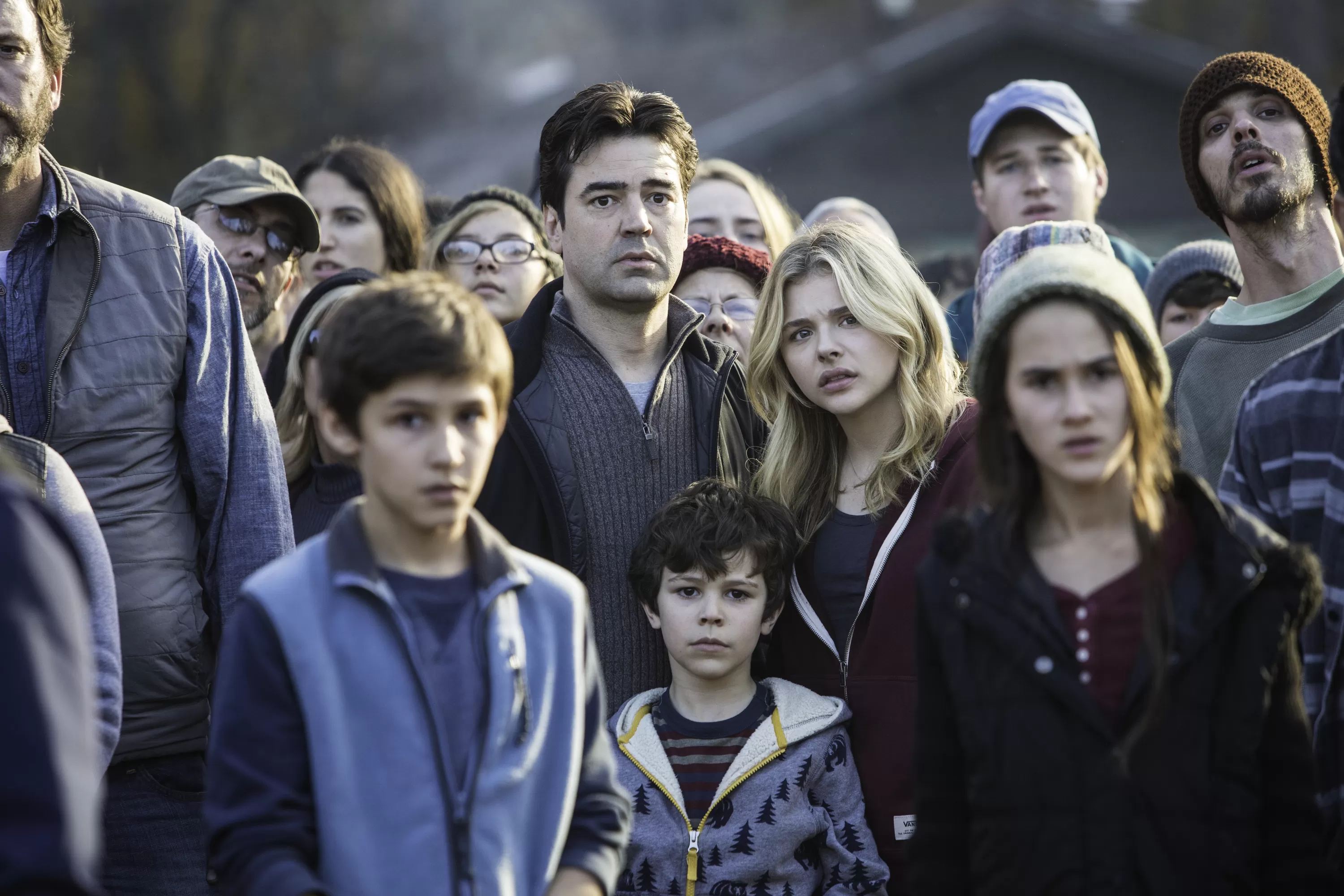 Ron Livingston, center left, and Chloë Grace Moretz, center right, and Zackary Arthur, below center, star in Columbia Pictures' 
